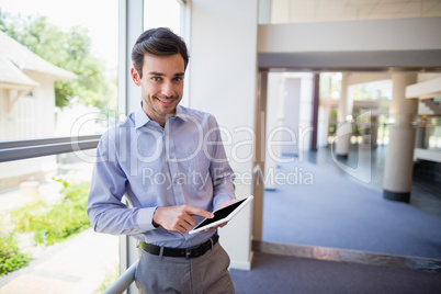 Businessman holding digital tablet