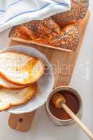 Braided Challah bread and honey