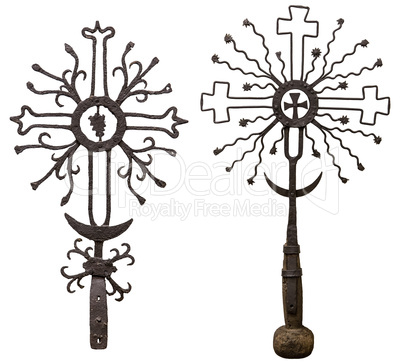 Ancient metal crosses isolated on white background