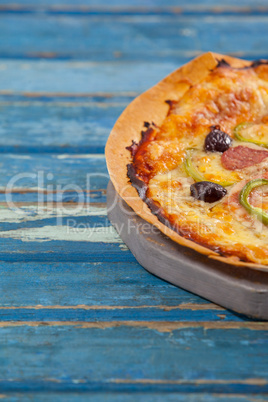 Delicious italian pizza served on pizza tray