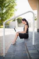 Businesswoman using laptop