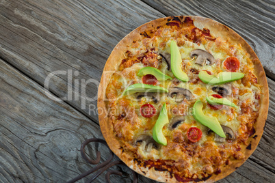 Italian pizza served on a wooden plank