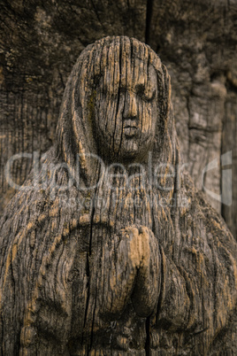 Virgin Mary carved on ancient wooden icon
