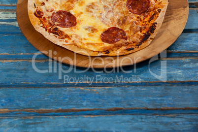 Delicious italian pizza served on pizza tray