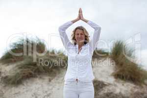 Mature woman doing meditation