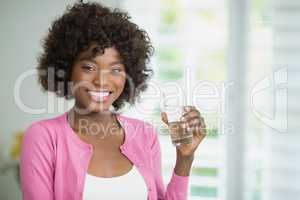 Beautiful woman having a glass of water