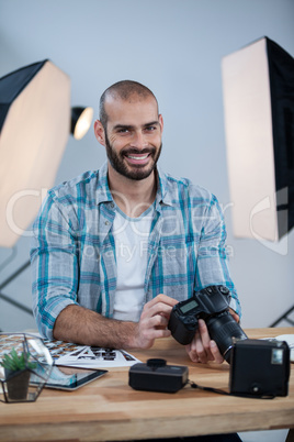 Photographer working over digital tablet