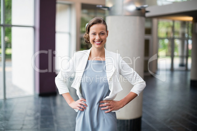 Cheerful businesswoman at conference centre