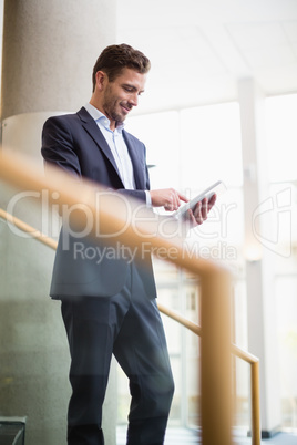 Businessman using digital tablet