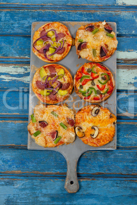 Various delicious italian pizza served on pizza tray