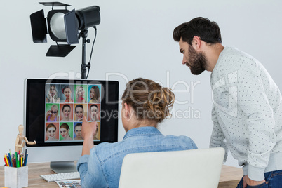 Photographers working at desk