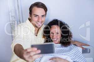 Couple taking selfie in ward