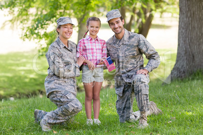military couple with their daughter