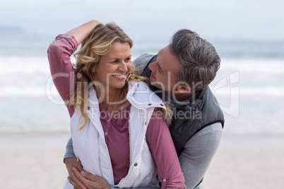 Mature couple enjoying on the beach