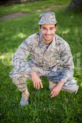 Portrait of soldier smiling in park