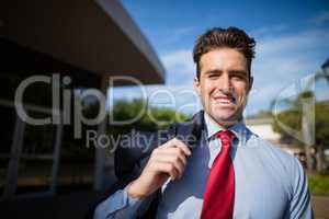 Confident businessman smiling