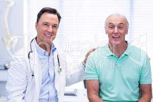 Portrait of doctor and senior patient