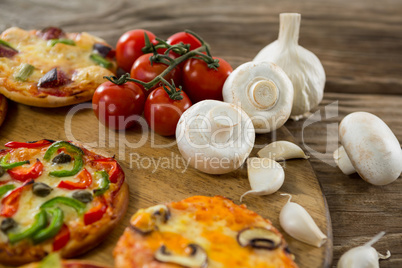 Close-up of pizza with tomatoes and garlics