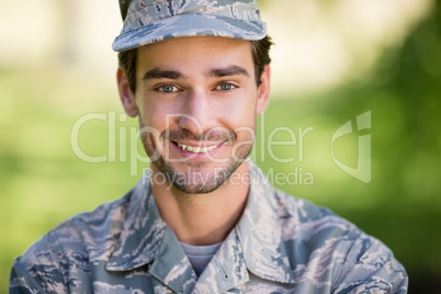 Portrait of soldier smiling in park