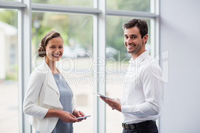 Cheerful business executives at conference centre