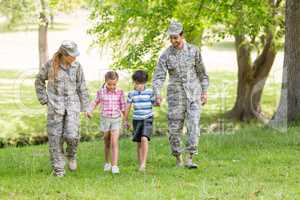 Military couple with their kids