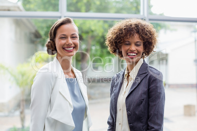 Cheerful business executives at conference centre Cheerful business executives at conference centre