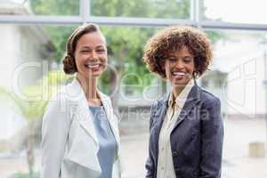 Cheerful business executives at conference centre