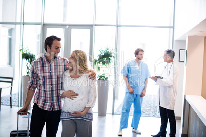 Couple interacting with each other in hospital