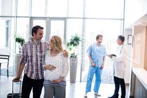 Couple interacting with each other in hospital