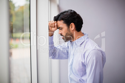 Stressed businessman at conference centre