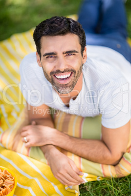 Portrait of man relaxing in park