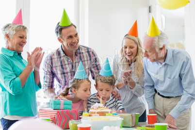 Happy multi- generation family celebrating a birthday