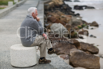 Senior man sitting on the steps