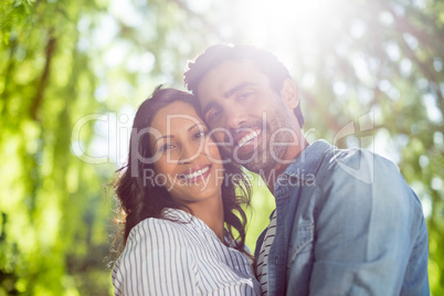 Portrait of a couple smiling in park