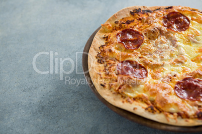 Italian pizza served in a pizza tray