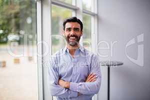 Cheerful businessman at conference centre