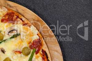 Italian pizza served on wooden board