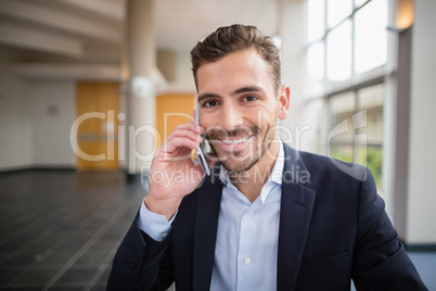 Businessman talking on mobile phone