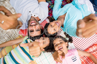 Portrait of family having fun in park