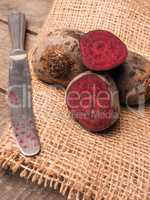 Organic beet root on rustic background