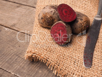 Organic beet root on rustic background