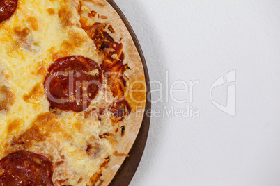 Delicious italian pizza served on pizza tray