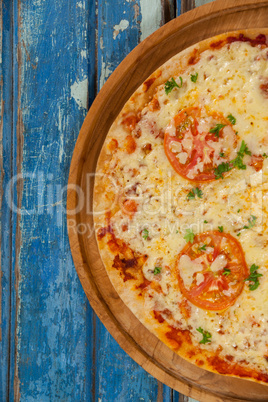 Delicious italian pizza served on pizza tray