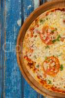 Delicious italian pizza served on pizza tray