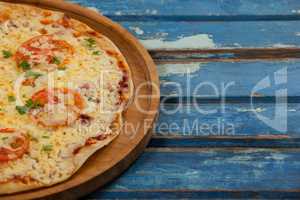 Delicious italian pizza served on pizza tray