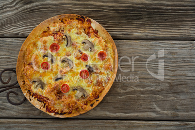 Close-up of a italian pizza on a plank