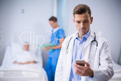 Doctor using mobile phone