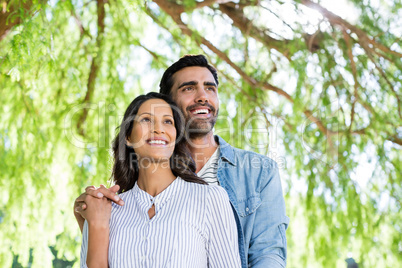 Portrait of couple smiling in park