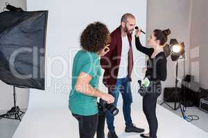 Male model preparing for a photo shoot