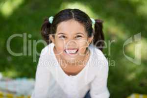 Portrait of girl smiling in park